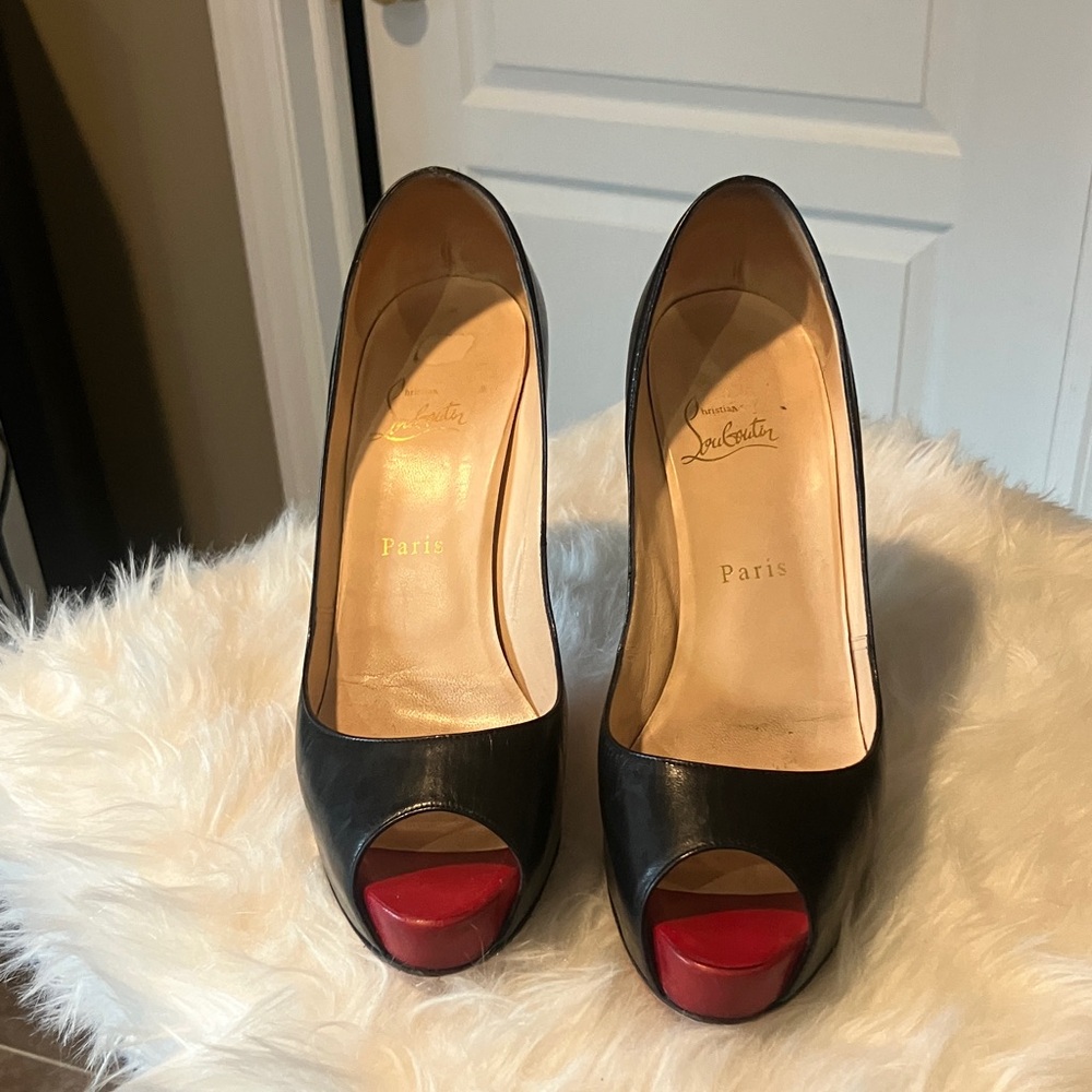 Christian Louboutin Black and Red Heels with Classic Eleganc